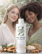Two women standing behind a bottle of Zenithal Full of Life Hair Conditioner with natural ingredients displayed.