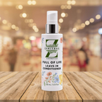 Zenithal Cosmetics Full of Life Leave-In Conditioner bottle on a wooden surface with a blurred background